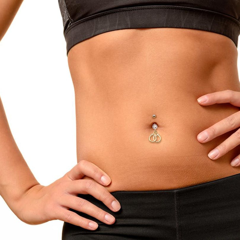 Piercing pour le nombril en plaqué or avec menottes pendantes