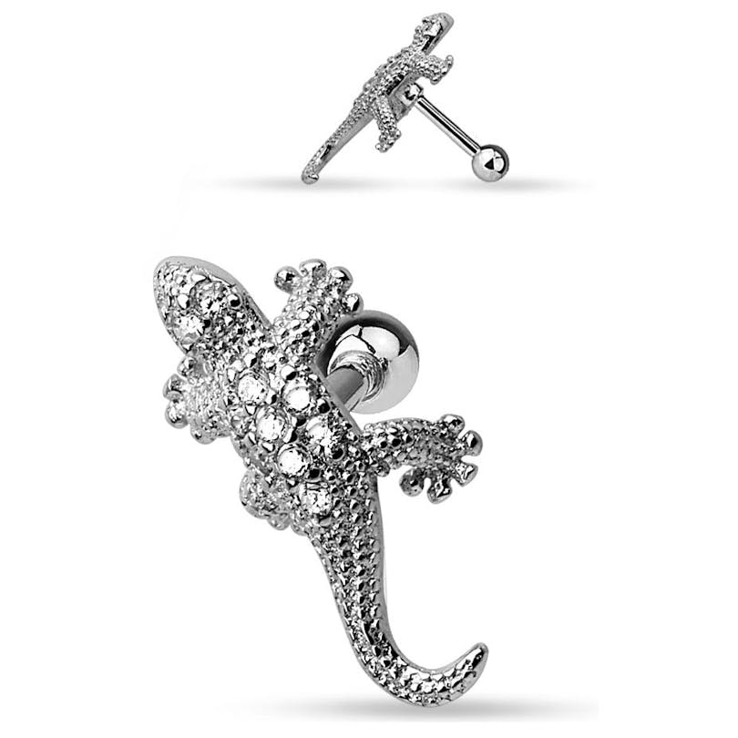Ohrpiercing mit Eidechse und Steinen