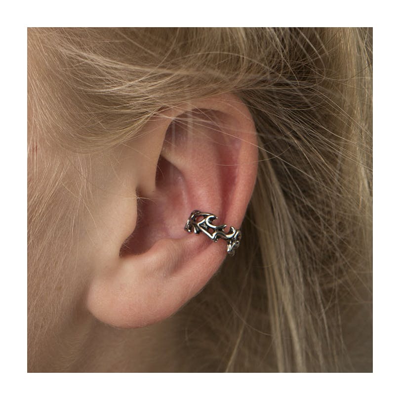 Manchette pour l'oreille avec motif troué